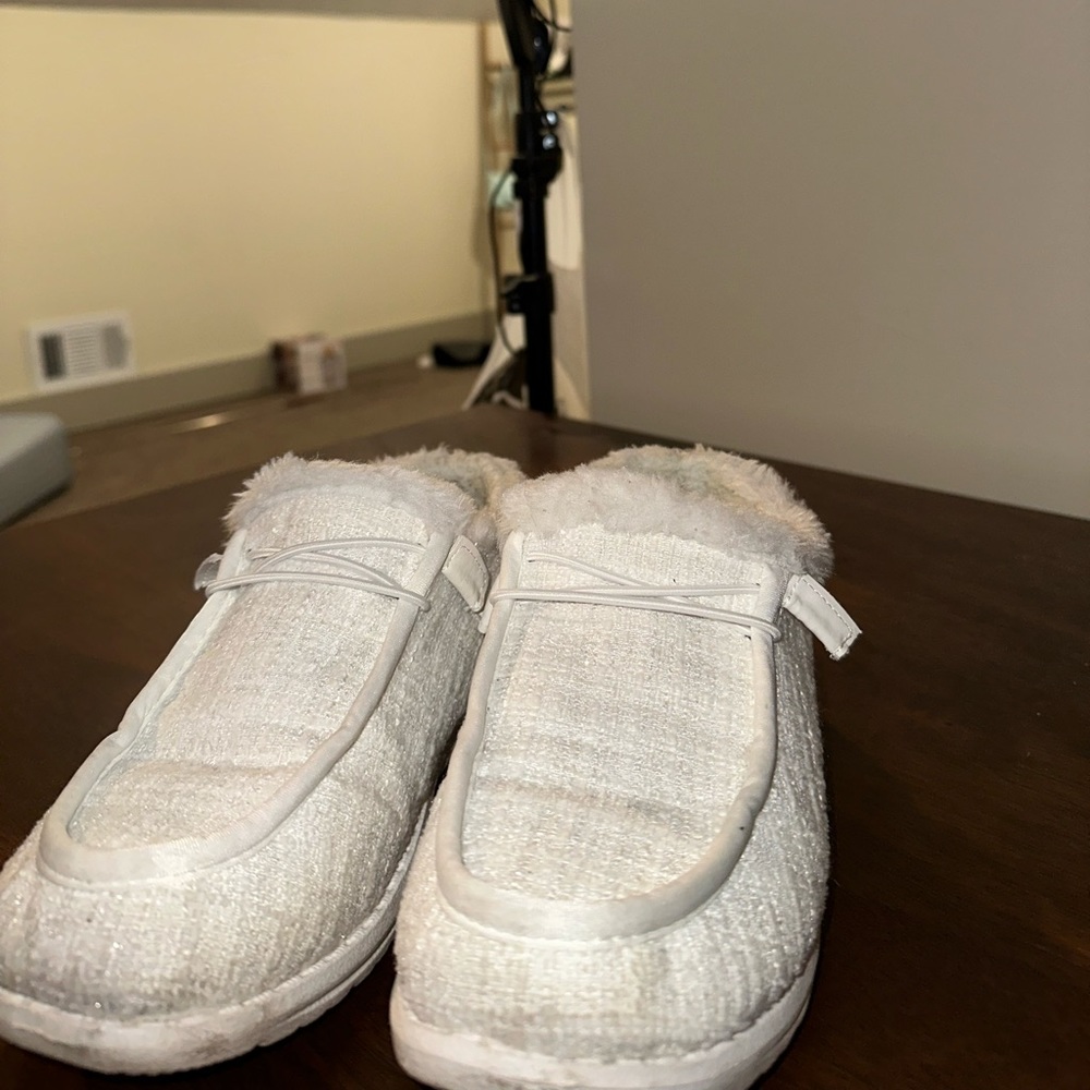 White fur slip ons